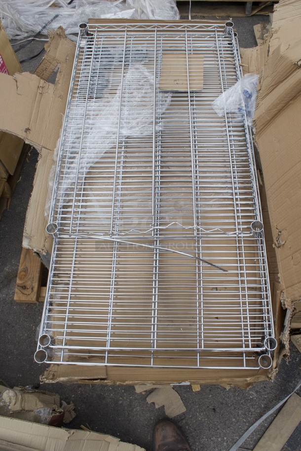 BRAND NEW SCRATCH & DENT! Regency 24" x 48" NSF Chrome Wire Shelf. (1) Shelf is smaller and damaged. 3 Pieces in total.  - Image 1 of 3