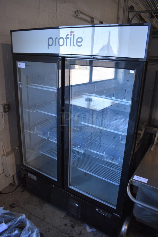 2019 Alcom Model GMF48-B Metal Commercial 2 Door Reach In Freezer Merchandiser w/ Poly Coated Racks on Commercial Casters. 115 Volts, 1 Phase. 54x31x81. Tested and Powers On But Does Not Get Cold