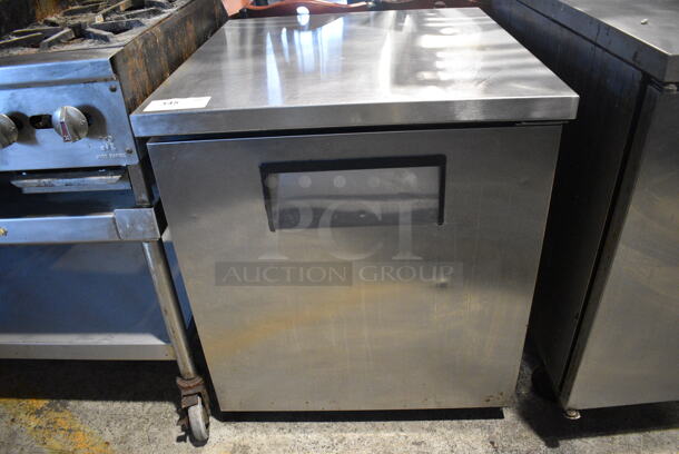 True Model TUC-27 Stainless Steel Commercial Single Door Undercounter Cooler. 115 Volts, 1 Phase. 27.5x30x32. Tested and Powers On But Does Not Get Cold