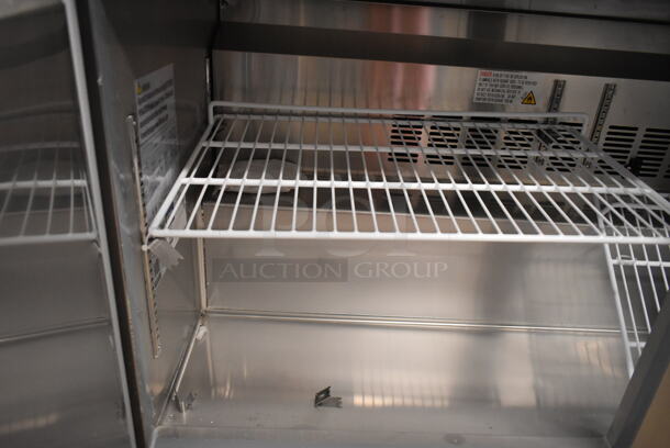 BRAND NEW SCRATCH AND DENT! 2023 Avantco 178SSWT60FHC Stainless Steel Commercial 2 Door Work Top Freezer on Commercial Casters. Right Door Does Not Stay Closed. 115 Volts, 1 Phase. Tested and Working! - Image 6 of 7