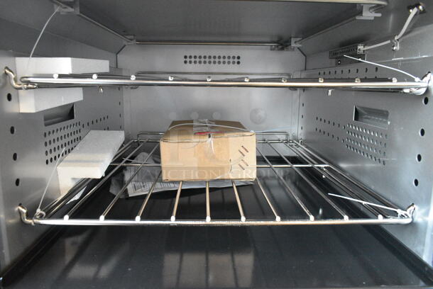 BRAND NEW SCRATCH AND DENT! Cooking Performance Group CPG 351ER24SC Stainless Steel Commercial 24" 4-Burner Electric Range with Space Saver Oven. 208 Volts, 3 Phase. - Image 5 of 10