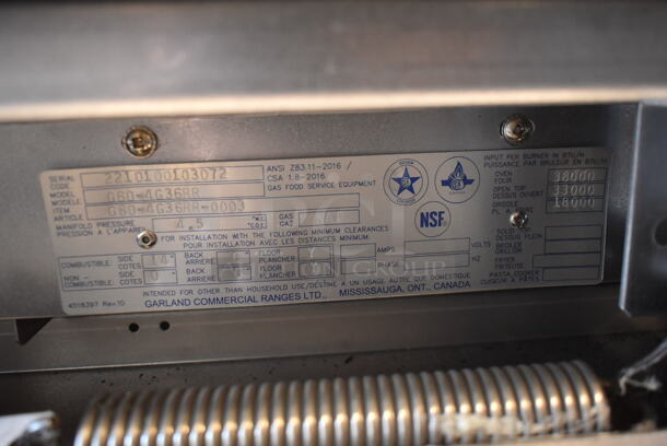 BRAND NEW SCRATCH AND DENT! Garland G60-4G36RR Stainless Steel Commercial Natural Gas Powered 4 Burner Range w/ Flat Top, 2 Ovens, Over Shelf and Back Splash.  - Image 10 of 10
