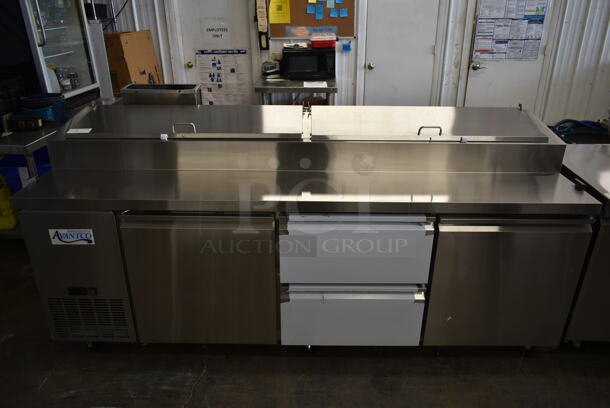 BRAND NEW SCRATCH AND DENT! 2023 Avantco 178SSPPT3 Stainless Steel Commercial Pizza Prep Table w/ 2 Doors and 2 Drawers on Commercial Casters. 115 Volts, 1 Phase. Tested and Working! - Image 2 of 9