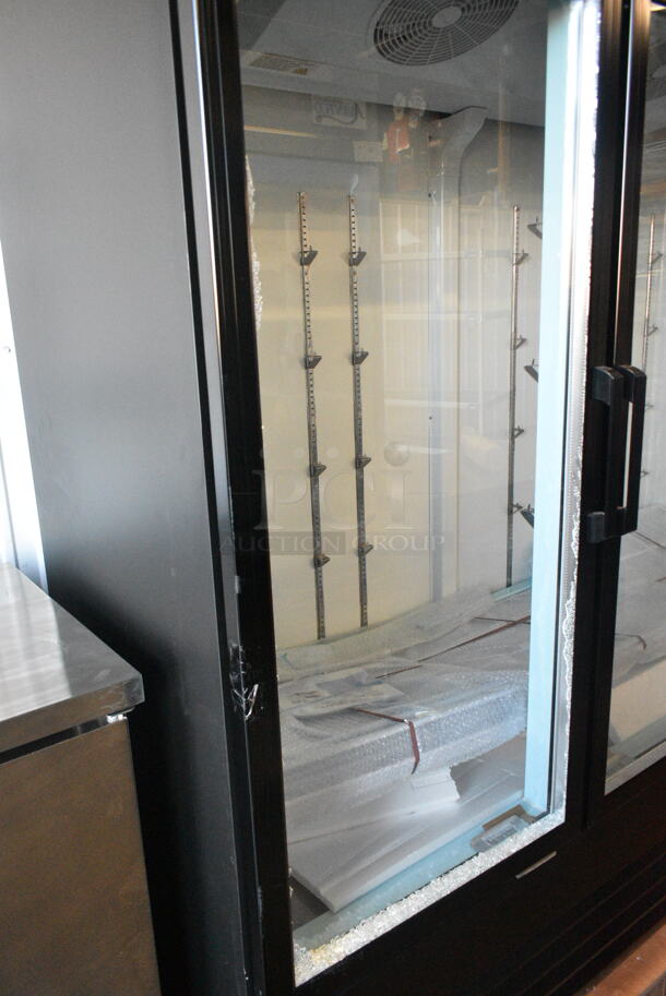 BRAND NEW SCRATCH AND DENT! 2024 Avantco 178GDC69HCB 78 1/4" Black Customizable Swing Glass Door Merchandiser Refrigerator with LED Lighting. See Pictures for Broken Glass. 115 Volts, 1 Phase. Tested and Working! - Image 3 of 8