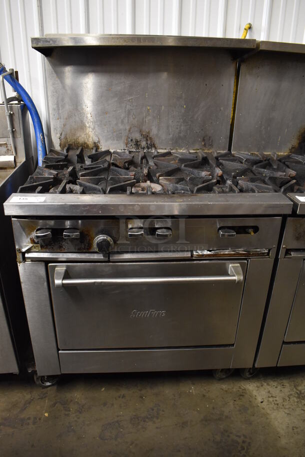 Garland SunFire Stainless Steel Commercial Natural Gas Powered 6 Burner Range w/ Oven, Over Shelf and Back Splash on Commercial Casters. 35.5x35x57