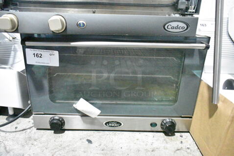 Cadco XA015 Stainless Steel Commercial Countertop Electric Powered Convection Oven w/ View Through Door and Metal Oven Rack. 120 Volts, 1 Phase. Cannot Test - Needs New Power Cord