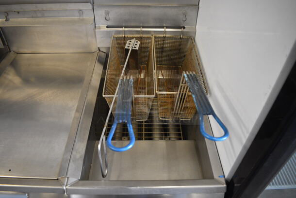 Pitco Frialator Model F14S-V Stainless Steel Commercial Floor Style Propane Gas 2 Bay Fryer w/ Center Dumping Station on Commercial Casters. 110,000 BTU. 49x32x54 - Image 4 of 10