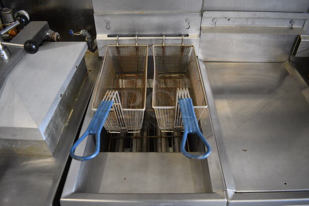 Pitco Frialator Model F14S-V Stainless Steel Commercial Floor Style Propane Gas 2 Bay Fryer w/ Center Dumping Station on Commercial Casters. 110,000 BTU. 49x32x54 - Image 5 of 10