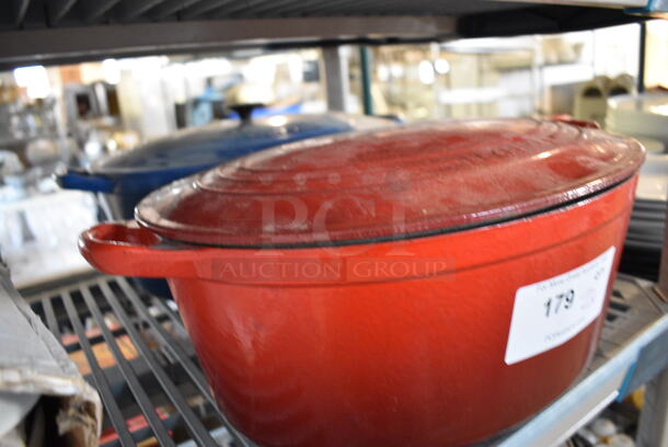 2 Ceramic Casserole Dishes w/ Lids. Blue and Red. 20x13x8. 2 Times Your Bid! - Image 2 of 3