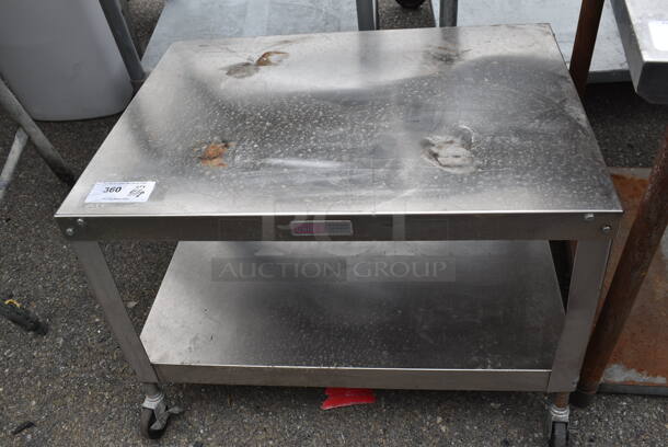 Stainless Steel Table w/ Metal Under Shelf on Commercial Casters.