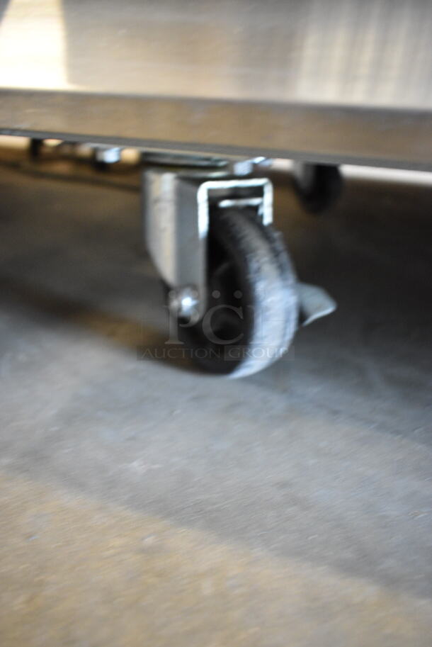 Avantco 178SS3FHC Stainless Steel Commercial 3 Door Reach In Freezer w/ Poly Coated Racks on Commercial Casters. 115 Volts, 1 Phase. Tested and Powers On But Does Not Get Cold - Image 8 of 9