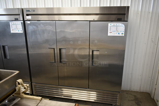 2017 True T-72F-HC Stainless Steel Commercial 3 Door Reach In Freezer w/ Poly Coated Racks on Commercial Casters. 115 Volts, 1 Phase. Tested and Working! - Image 1 of 9