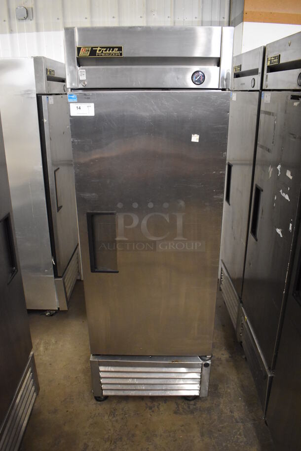 2013 True T-23F ENERGY STAR Stainless Steel Commercial Single Door Reach In Freezer w/ Poly Coated Racks on Commercial Casters. 115 Volts, 1 Phase. 27x30x83.5. Tested and Working!