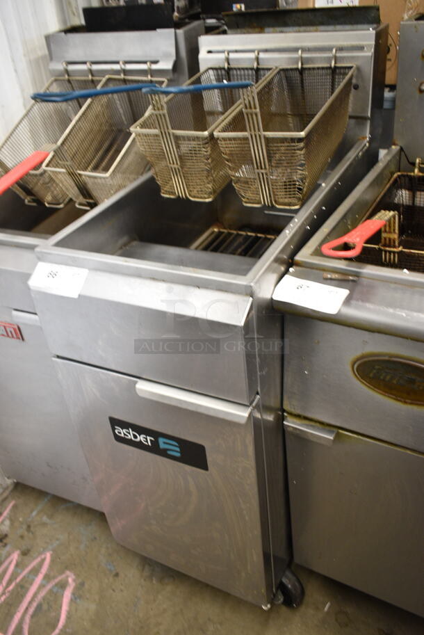 2019 Asber AEF40-50 Stainless Steel Commercial Floor Style Natural Gas Powered Deep Fat Fryer w/ 2 Metal Fry Baskets on Commercial Casters. 114,000 BTU.  - Image 5 of 5