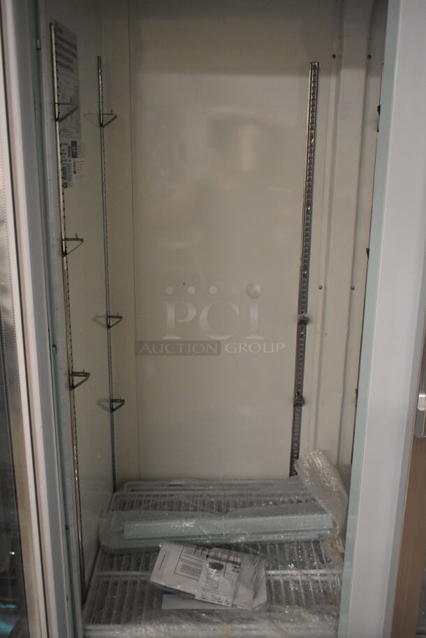 BRAND NEW SCRATCH AND DENT! 2023 Avantco 178GDC40HCW Metal Commercial 48" White Swing Glass Door Merchandiser Refrigerator with LED Lighting and Poly Coated Racks. 115 Volts, 1 Phase. Tested and Working! - Image 5 of 6