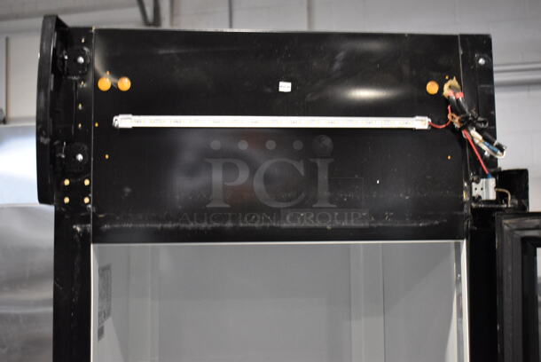 BRAND NEW SCRATCH AND DENT! KoolMore MDR-1GD-13C Metal Commercial Single Door Reach In Cooler Merchandiser w/ Poly Coated Racks on Commercial Casters. 115 Volts, 1 Phase. Tested and Working! - Image 6 of 8