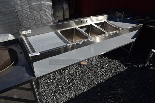 BRAND NEW SCRATCH AND DENT! Regency 600S31014219 Stainless Steel Commercial Back Bar 3 Bay Sink w/ Dual Drain Boards. Bays 10x14. Drain Boards 17.5x15 - Image 1 of 5