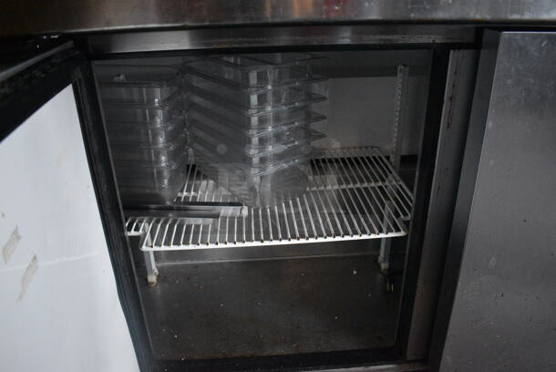 2011 True TSSU-72-30M-B-ST Stainless Steel Commercial Pizza Prep Table on Commercial Casters. BUYER MUST REMOVE. 115 Volts, 1 Phase. 72x34x38. Item Was in Working Condition on Last Day of Business. (Susquehanna Ale House) - Image 7 of 8
