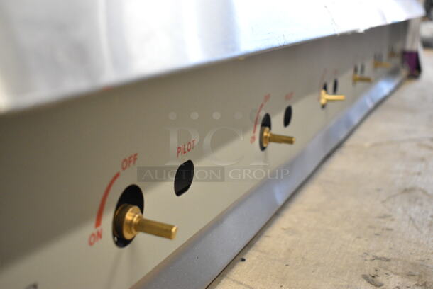 BRAND NEW SCRATCH AND DENT! Cooking Performance Group CPG 351GMCPG72NL Stainless Steel Commercial 72" Gas Countertop Griddle with Manual Controls. 180,000 BTU.  - Image 3 of 4