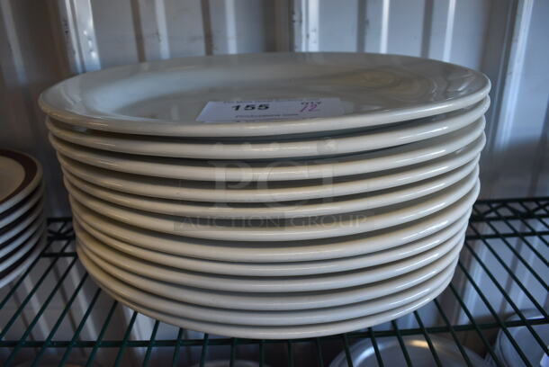 12 White Ceramic Oval Plates. 12.5x9x1. 12 Times Your Bid!