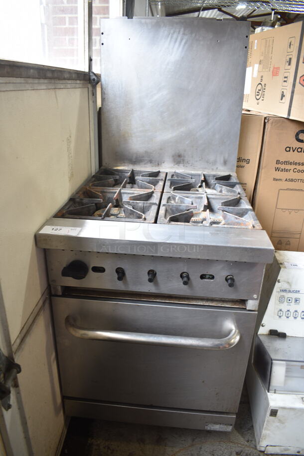 Cooking Performance Group CPG 351S24N Stainless Steel Commercial Natural Gas Powered 4 Burner Range w/ Oven and Back Splash on Commercial Casters. 150,000 BTU.  - Image 1 of 6