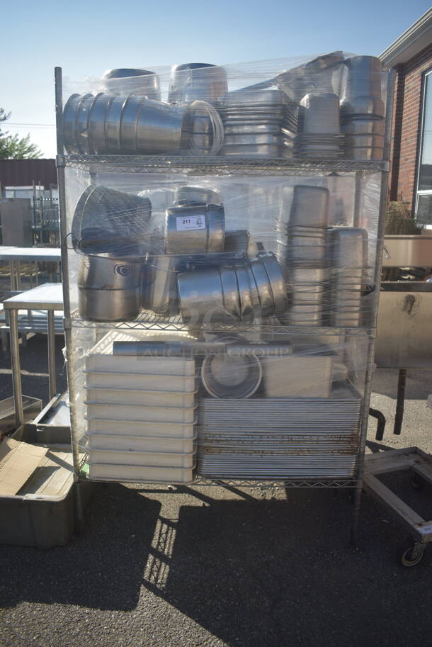 ALL ONE MONEY! Lot of Items Including Open Utility Shelf With Metro Style Shelving On Galvanized Legs, Steel Bins In Variety of Sizes, Steel Pots, Baking Trays, Baking Sheets, AND MORE!  BUYER MUST DISMANTLE. PCI CANNOT DISMANTLE FOR SHIPPING. PLEASE CONSIDER FREIGHT CHARGES.