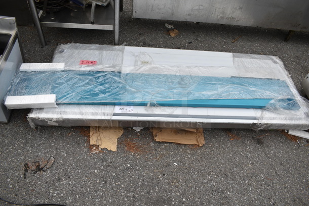 BRAND NEW SCRATCH AND DENT! Regency 600TSB3072S 30" x 72" 16-Gauge Stainless Steel Commercial Work Table with 4" Backsplash and Undershelf - Image 2 of 5