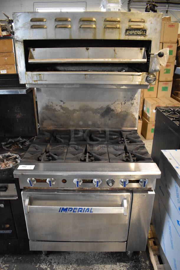 Imperial Stainless Steel Commercial Natural Gas Powered 6 Burner Range w/ Oven, Salamander Cheese Melter and Back Splash.