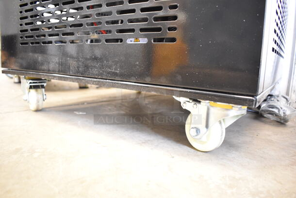 BRAND NEW SCRATCH AND DENT! Avantco 193GD4C15HCB Black 4-Sided Glass Refrigerated Display Case on Commercial Casters. See Pictures for Broken Glass. 110-120 Volts, 1 Phase. Tested and Working! - Image 5 of 10