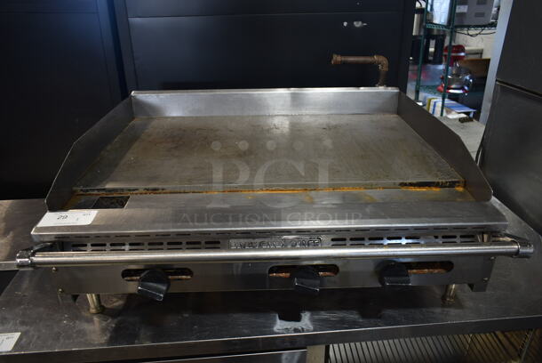 American Range Stainless Steel Commercial Countertop Natural Gas Powered Flat Top Griddle. 