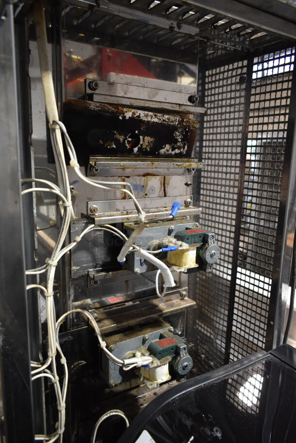 Rotisol 1350.8 Stainless Steel Commercial Floor Style Natural Gas Powered Rotisserie Oven on Commercial Casters.  - Image 2 of 8