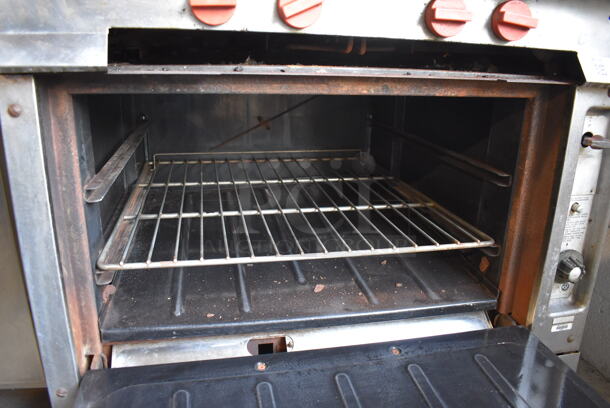 Vulcan Stainless Steel Commercial Natural Gas Powered 4 Burner Range w/ Oven, Over Shelf and Back Splash on Commercial Casters. 43.5x40x61 - Image 11 of 11