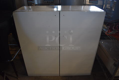White 2 Door Cabinet. 36x13x36