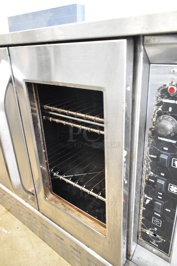 Royal Stainless Steel Commercial Gas Powered Full Size Convection Oven w/ Solid Door, View Through Door, Metal Oven Racks and Thermostatic Controls. See Pictures for Broken Glass Door.  - Image 3 of 5