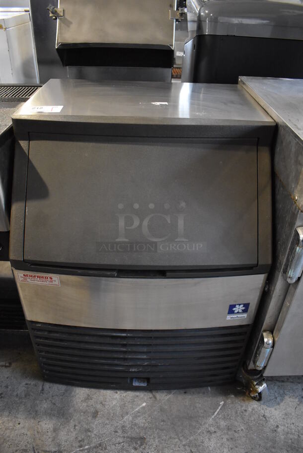 2012 Manitowoc QY0134A Stainless Steel Commercial Self Contained Undercounter Ice Machine. 115 Volts, 1 Phase. 26x28x33