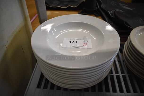 12 White Ceramic Pasta Plates. 12x12x1.5. 12 Times Your Bid!