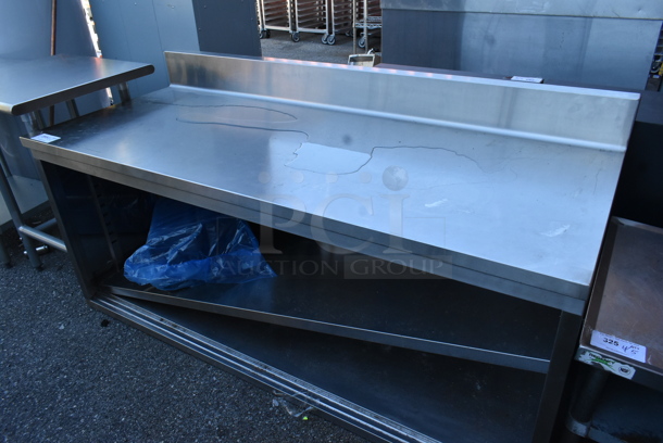 Stainless Steel Table w/ Back Splash and Under Shelf. 