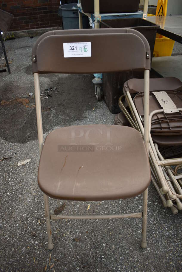 9 Brown Metal and Poly Folding Chairs. 18x19x32. 9 Times Your Bid!