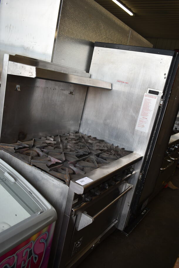 Wolf Stainless Steel Commercial Natural Gas Powered 6 Burner Range w/ Oven, Back Splash and Over Shelf on Commercial Casters.  - Image 3 of 12