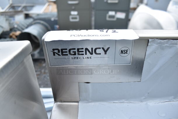 BRAND NEW SCRATCH AND DENT! Regency Spec Line Stainless Steel Commercial 30" x 30" 14 Gauge Stainless Steel Corner Work Table with Hinged Door and Lock - Image 7 of 7