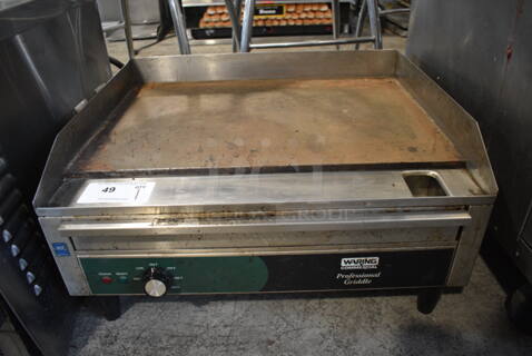 Waring Professional Stainless Steel Commercial Countertop Electric Powered Flat Top Griddle w/ Thermostatic Controls. 250 Volts, 1 Phase. 24x20x12.5