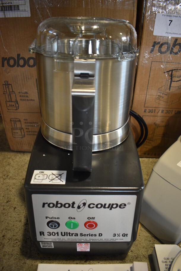 BRAND NEW SCRATCH AND DENT! Robot Coupe Model R 301 U Series D Metal Commercial Countertop Food Processor w/ Bowl, Lid, S Blade, Slicing Blade, Grating Blades and Continuous Feed Head Attachment. 120 Volts, 1 Phase. 8x12x17. 8.5x13x14. Tested and Working! - Image 4 of 9