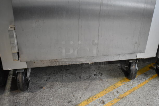 Traulsen G10011 ENERGY STAR Stainless Steel Commercial Single Door Reach In Cooler w/ Poly Coated Racks on Commercial Casters. 115 Volts, 1 Phase. Tested and Working! - Image 3 of 5