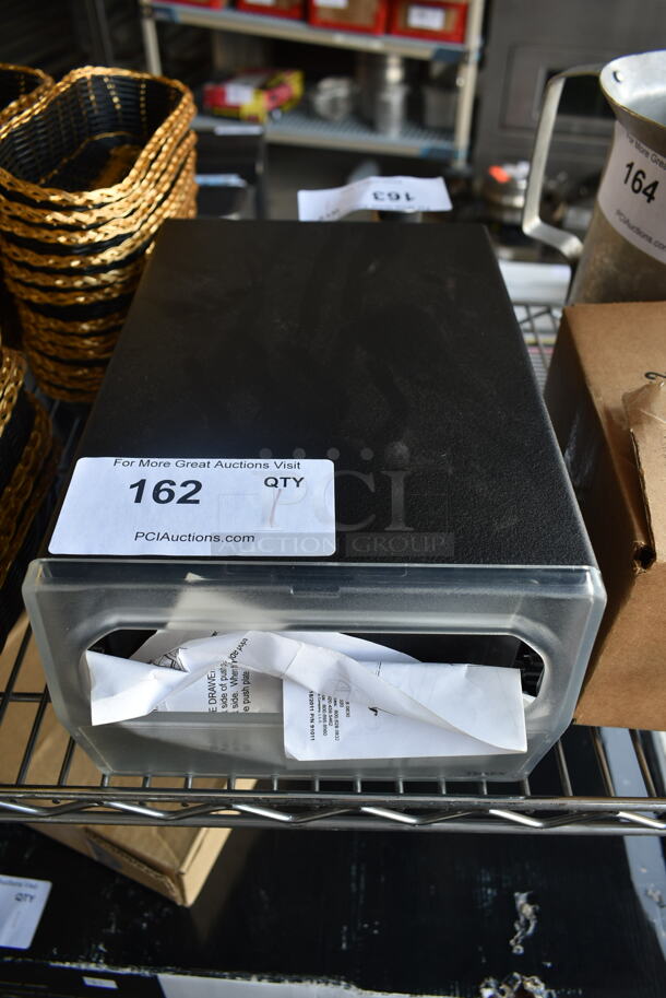 BRAND NEW! Black Metal Napkin Dispenser w/ Clear Poly Face. - Image 1 of 6