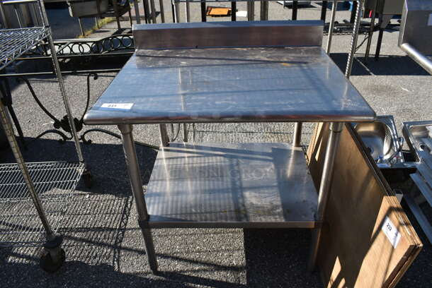 Stainless Steel Table w/ Under Shelf and Back Splash. 36x30x39