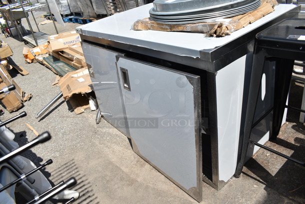 BRAND NEW SCRATCH AND DENT! Regency 600EBT3048D 30" x 48" 16 Gauge Type 304 Stainless Steel Enclosed Base Table with Sliding Doors and Adjustable Midshelf - Image 2 of 7