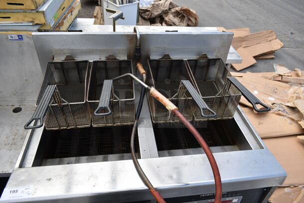 Henny Penny Stainless Steel Commercial Floor Style Natural Gas Powered 2 Bay Deep Fat Fryer w/ 4 Metal Fry Baskets on Commercial Casters. - Image 5 of 5