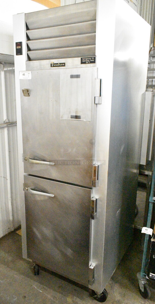 Traulsen G10000 Stainless Steel Commercial 2 Half Size Door Reach In Cooler on Commercial Casters. 115 Volts, 1 Phase. Tested and Powers On But Does Not Get Cold - Image 1 of 7