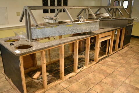 Buffet Station w/ 2 Steam Table Inserts and Sneeze Guard. BUYER MUST REMOVE: Bring Tools and Manpower Needed To Remove This Item. This Unit Was In Working Condition When the Restaurant Closed. (main dining room)