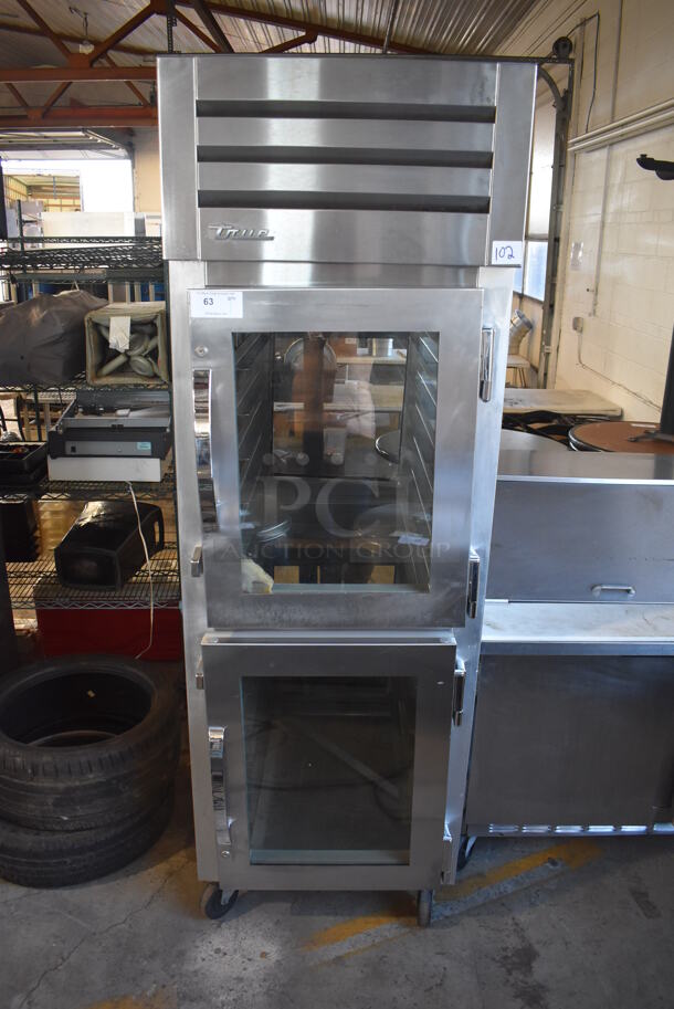 2014 True STG1HPT-2HG-2HG Stainless Steel Commercial 2 Half Size Door Reach In Pass Through Cooler Merchandiser on Commercial Casters. 250 Volts, 1 Phase. 27.5x36.5x84 - Image 1 of 6